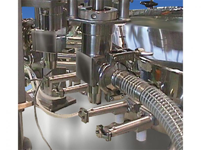 Close up of the mechanics of the TT-9CW high speed pouch fill and seal machine