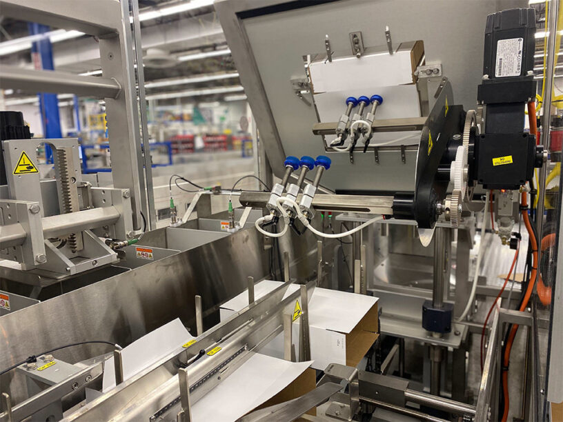 Close up of the Bartelt VP-1 Variety Pack Cartoning equipment