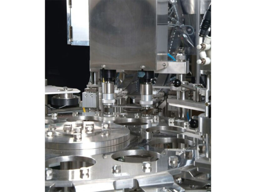 A zoomed in view of the TT-15CW-10 high speed spouted pouch filler and sealer